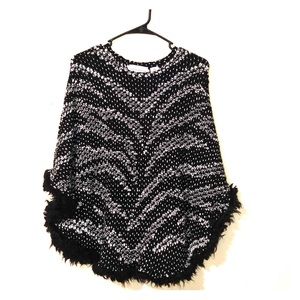 Black and white poncho with fur